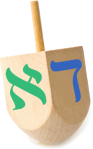 dreidel showing the Hebrew letters for "D" and "A"