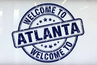 sign reading "Welcome to Atlanta"