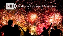 Fireworks exploding with people in the foreground and National Library of Medicine text at the top.